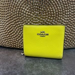 Small bright yellow coach wallet